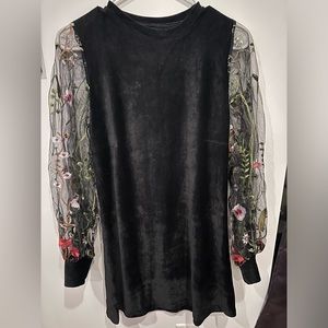 Long sleeve dress with beautiful embroidery.